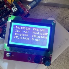 A LCD screen showing dew point calculations